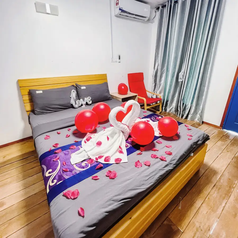 Romantic double room setup with sea views at Amina Holidays on Mabul Island