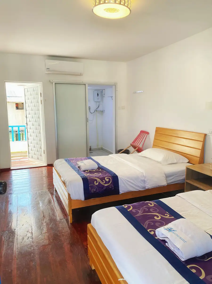 Bright Deluxe Twin Room with sea view at Amina Holidays on Mabul Island